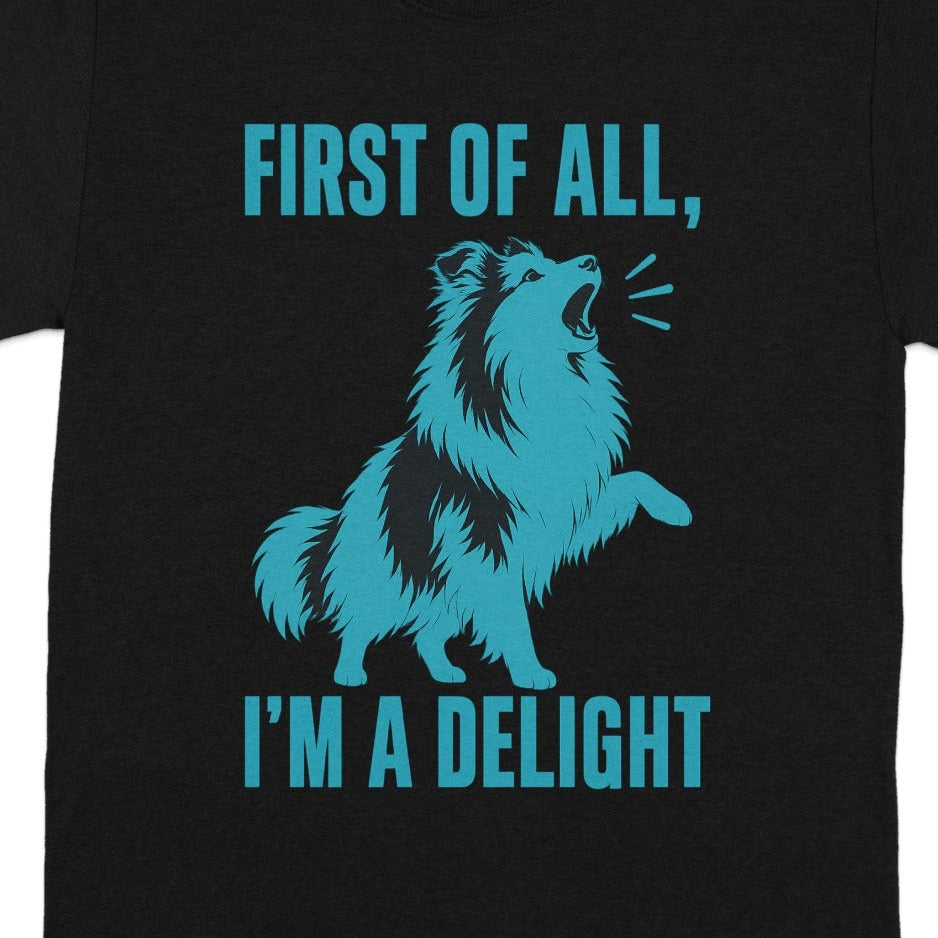 Black t-shirt with blue text and dog graphic: "FIRST OF ALL, I'M A DELIGHT"
