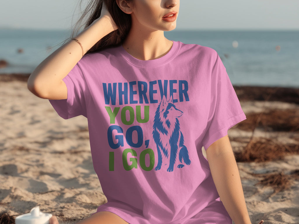 Pink t-shirt with "Wherever You Go, I Go" and wolf graphic.