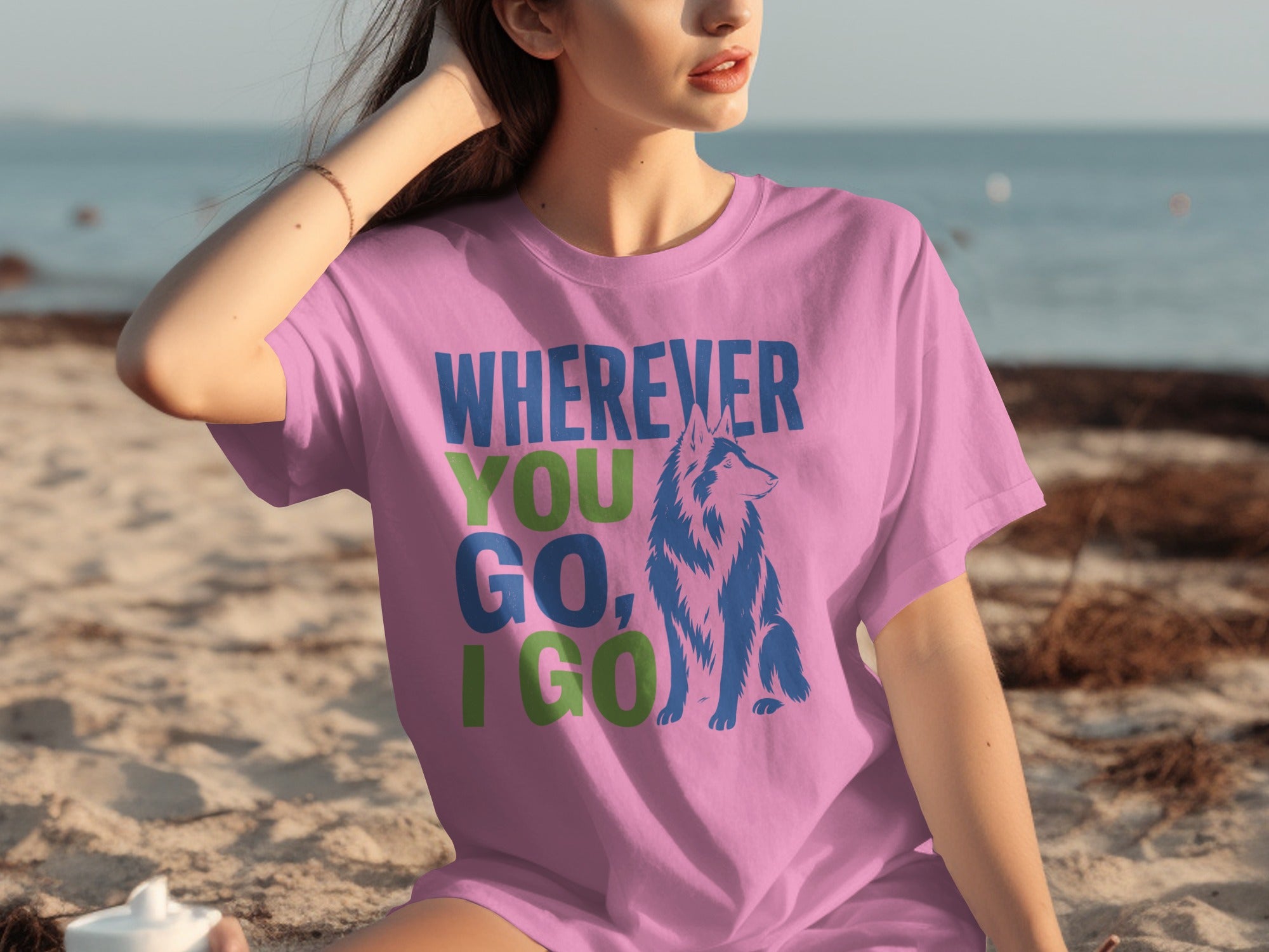 Pink t-shirt with "Wherever You Go, I Go" and wolf graphic.