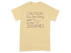 T-shirt with text "CAUTION: may start talking about my dog's ZOOMIES" and dog illustration.