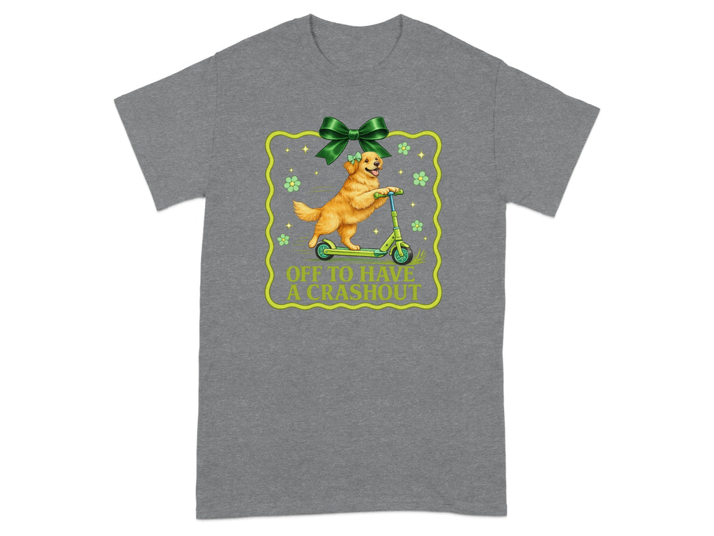 Golden retriever riding a scooter with the text "OFF TO HAVE A CRASHOUT"