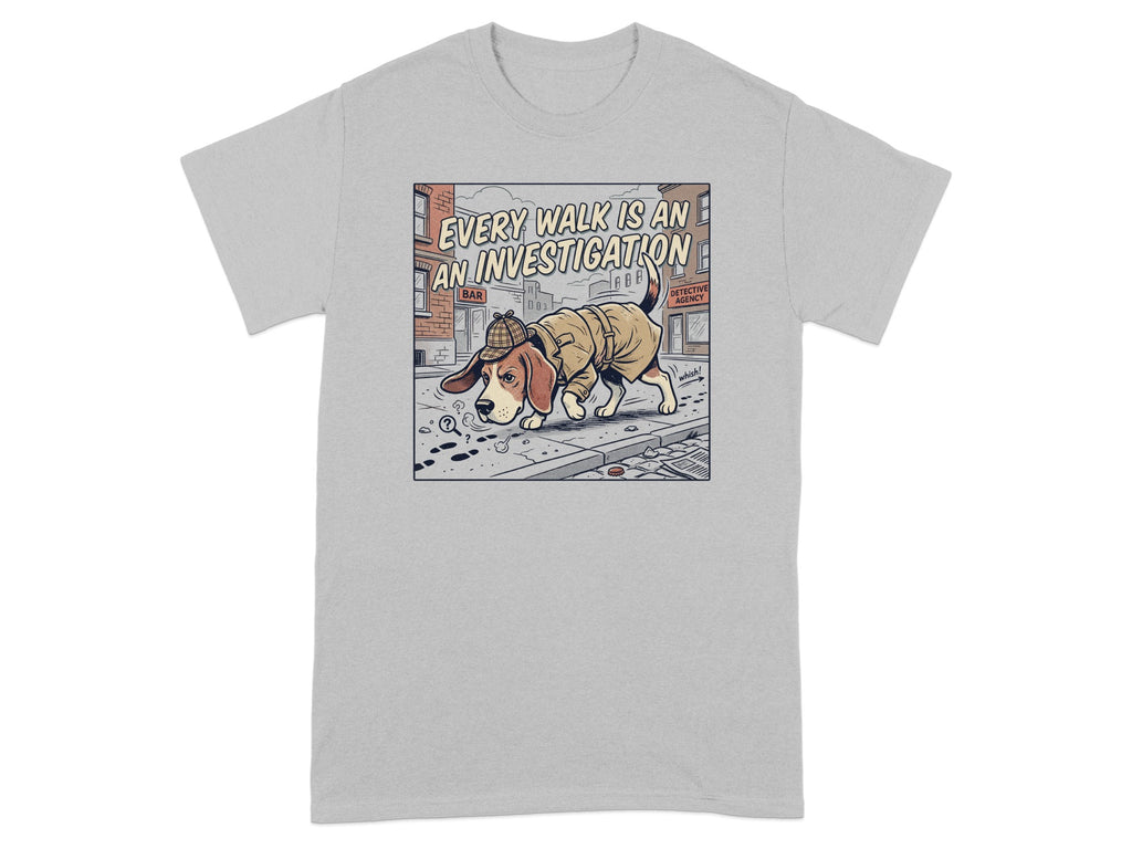 T-shirt with cartoon beagle detective investigating paw prints and a magnifying glass.