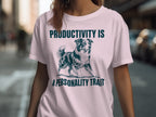 Pink t-shirt with a dog illustration and text "PRODUCTIVITY IS A PERSONALITY TRAIT".