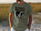 Olive green t-shirt with a border collie and ball design and "NO THOUGHTS ONLY TASKS" text.