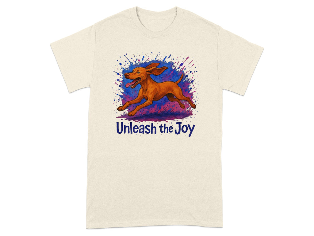 Orange dog with ears back and tongue out, splattered paint, and text "Unleash the Joy".