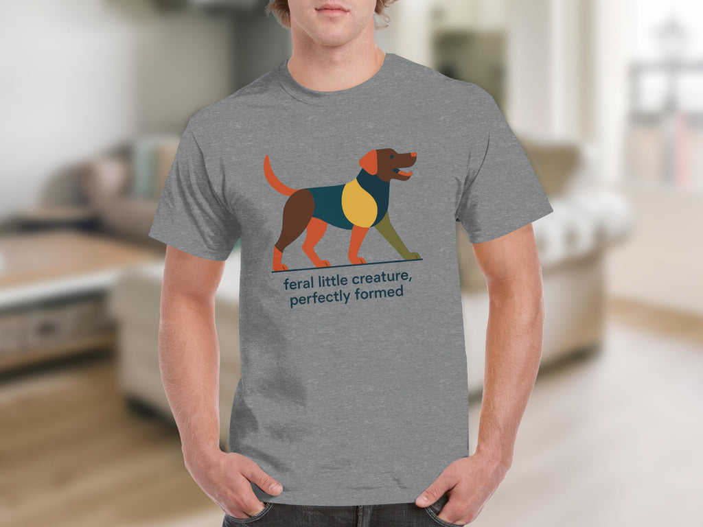 Grey t-shirt with geometric dog graphic and text "feral little creature, perfectly formed".
