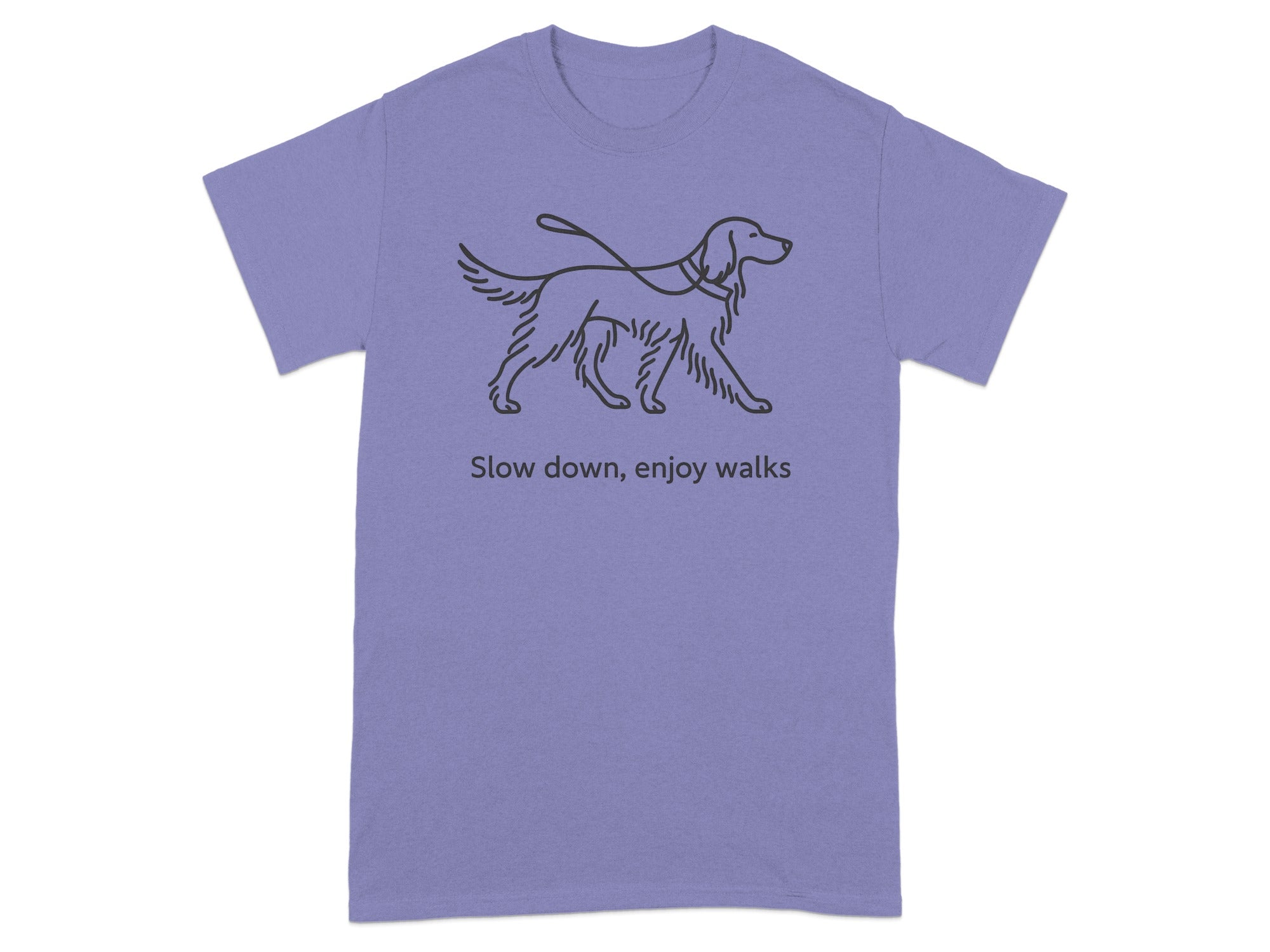 Purple t-shirt with a line drawing of a dog on a leash and the text "Slow down, enjoy walks".