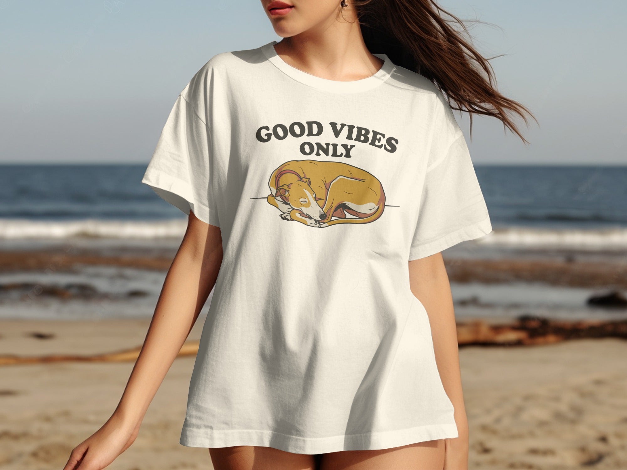 White t-shirt with "GOOD VIBES ONLY" text and sleeping dog graphic.