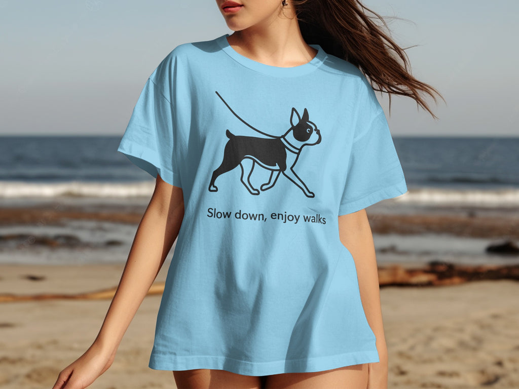 Light blue t-shirt with a black Boston Terrier graphic and "Slow down, enjoy walks" text.