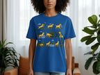 Blue t-shirt with a cartoon illustration of a yellow labrador in various outdoor activities.