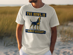 White t-shirt with a dog and text "The howl is always necessary".