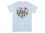 Light blue t-shirt with a heart-shaped pattern of Labradors and paw prints.
