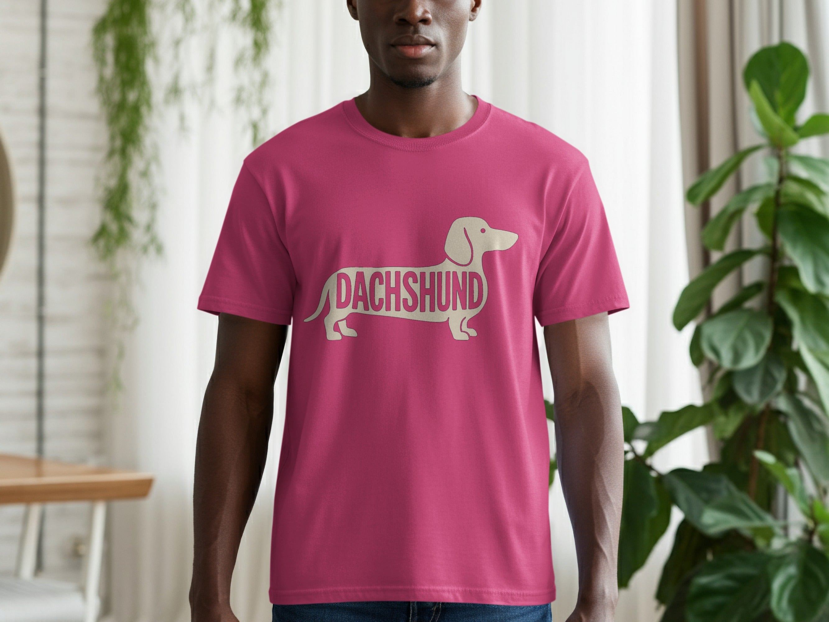 Pink t-shirt with dachshund silhouette filled with the word DACHSHUND.