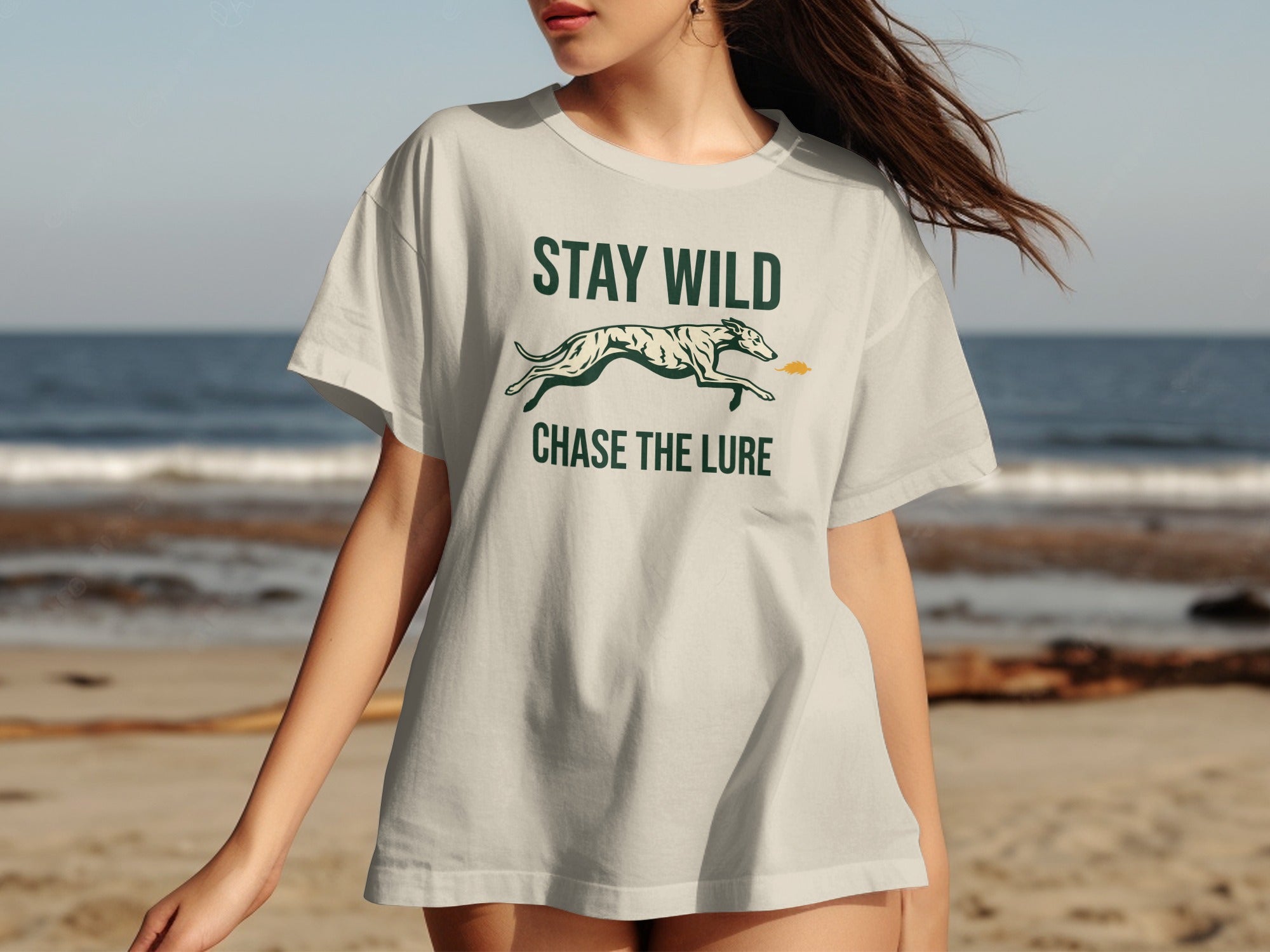 Light gray t-shirt with "STAY WILD CHASE THE LURE" text and dog silhouette.