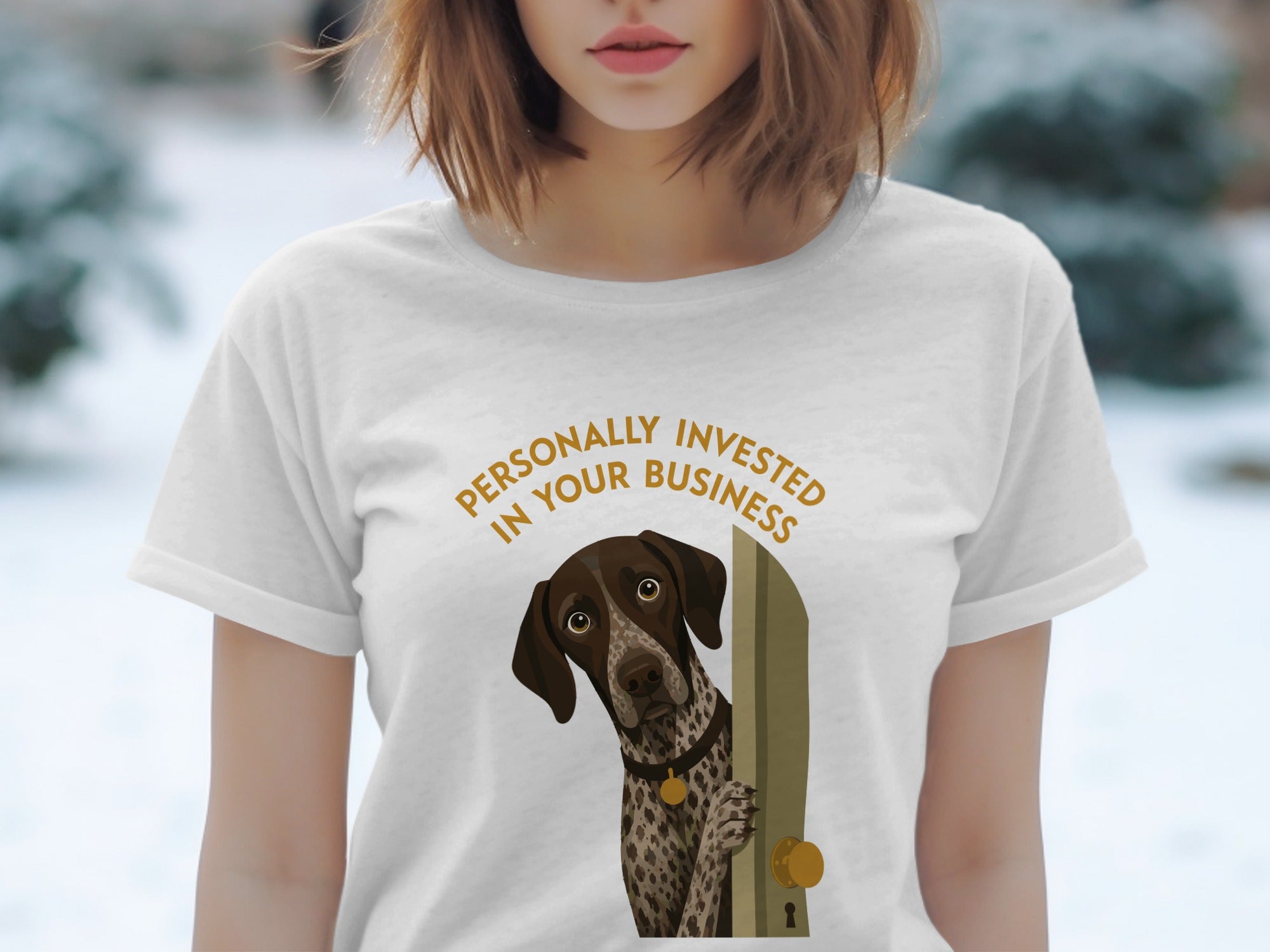 White t-shirt with a German Shorthaired Pointer peering through a door.