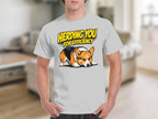 White t-shirt with illustration of a corgi dog and text "HERDING YOU FOR EFFICIENCY".