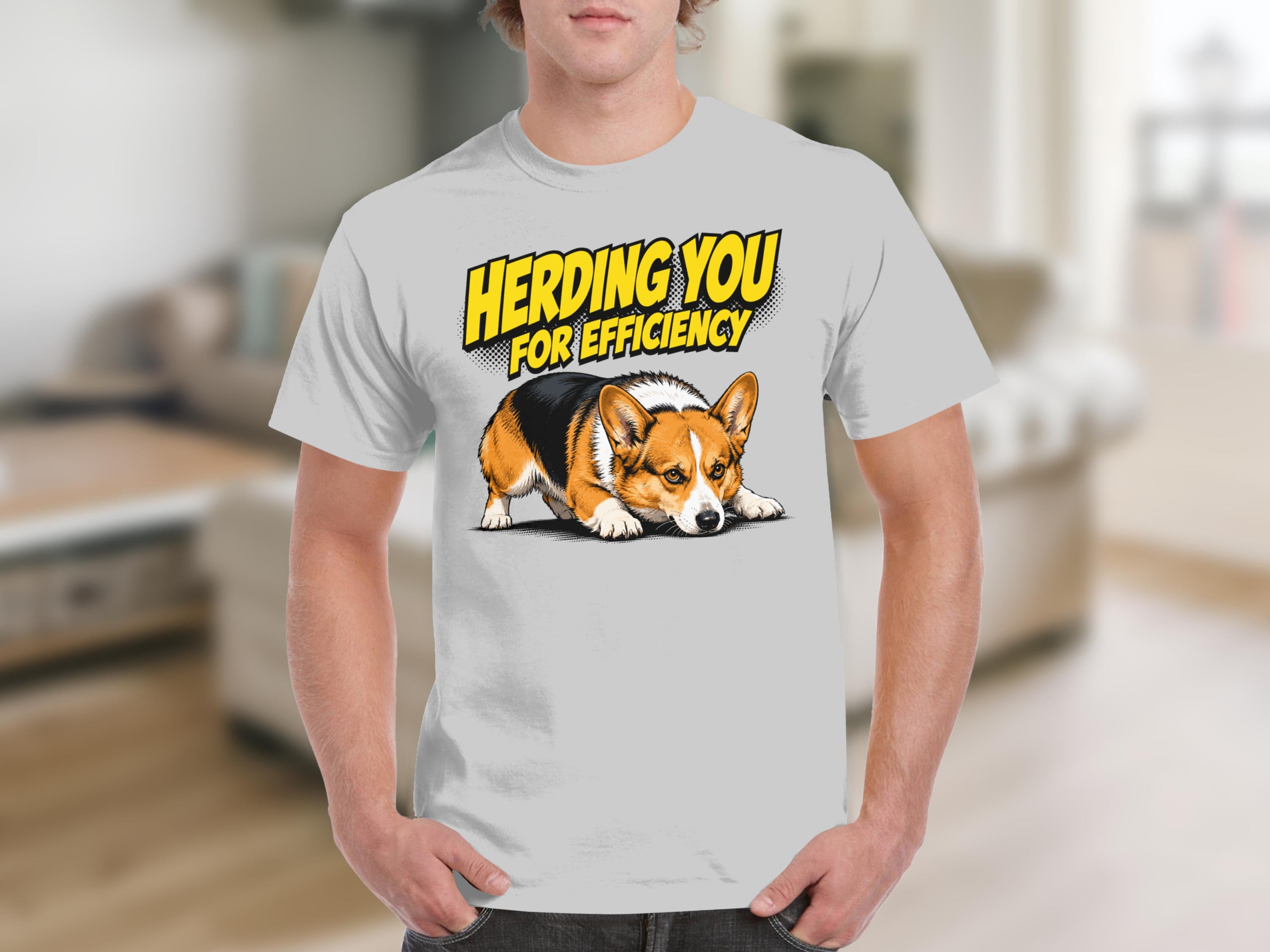 White t-shirt with illustration of a corgi dog and text "HERDING YOU FOR EFFICIENCY".
