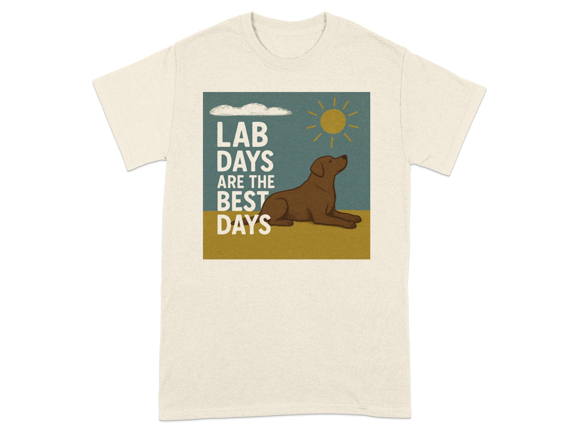 Cream t-shirt with graphic of brown dog, sun, clouds, and text "LAB DAYS ARE THE BEST DAYS".