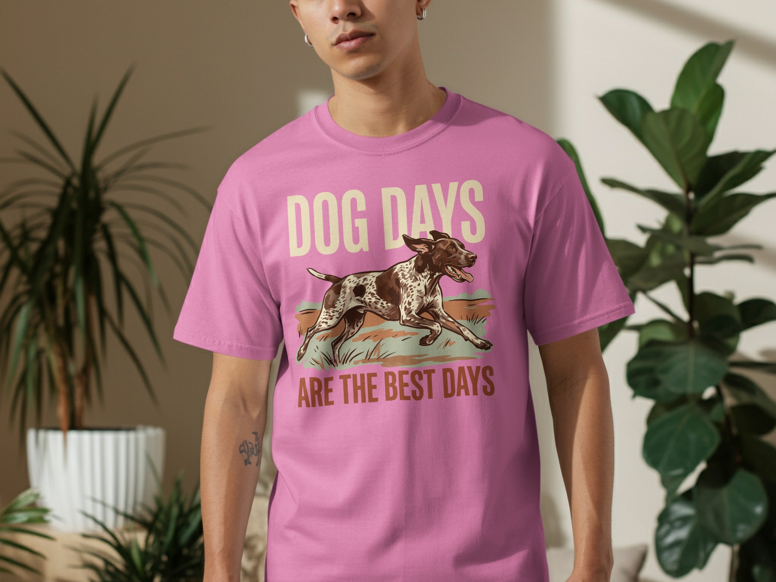 Pink t-shirt with brown dog running and text "DOG DAYS ARE THE BEST DAYS".
