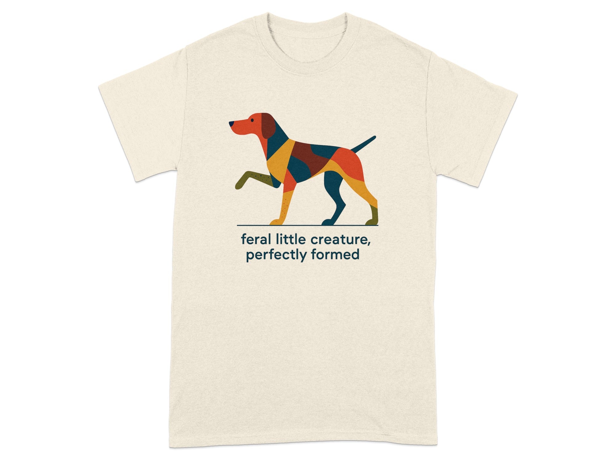 Cream t-shirt with abstract dog graphic and text: “feral little creature, perfectly formed”