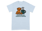 Light blue t-shirt with cartoon dog, coffee cup, tennis ball, and text.