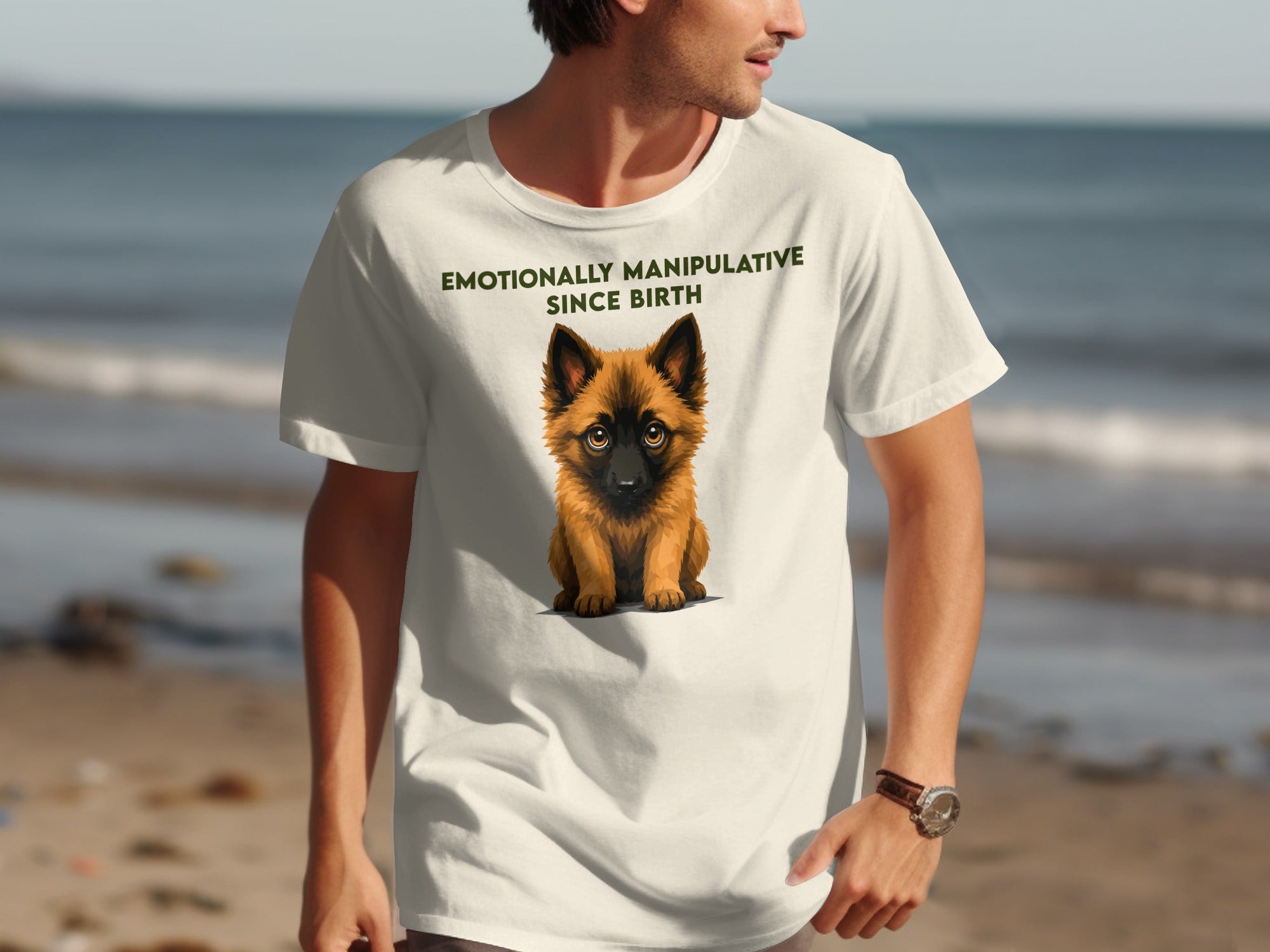Cream t-shirt with a German Shepherd puppy and text "Emotionally Manipulative Since Birth."