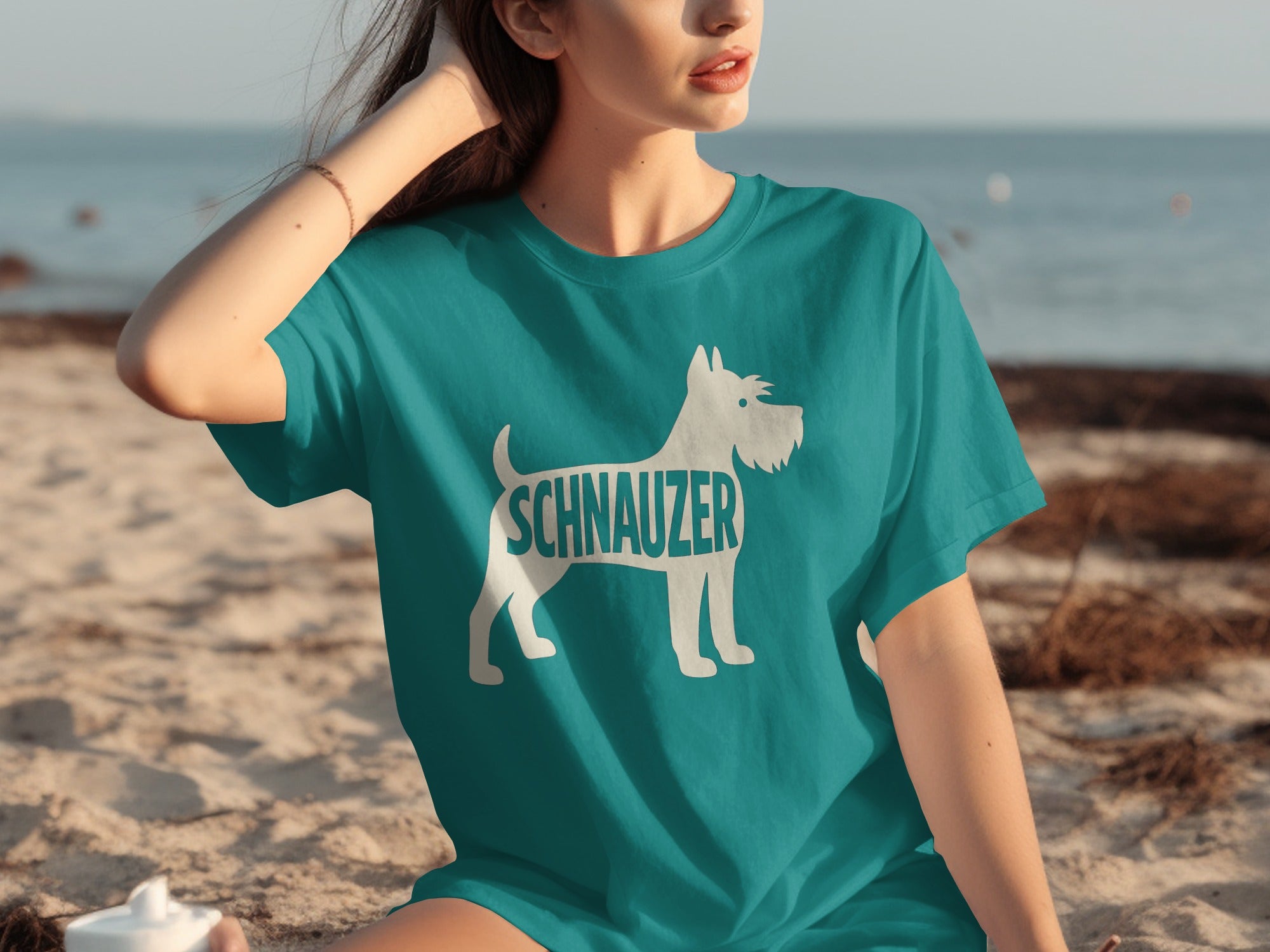 Teal t-shirt with white Schnauzer dog silhouette and text.