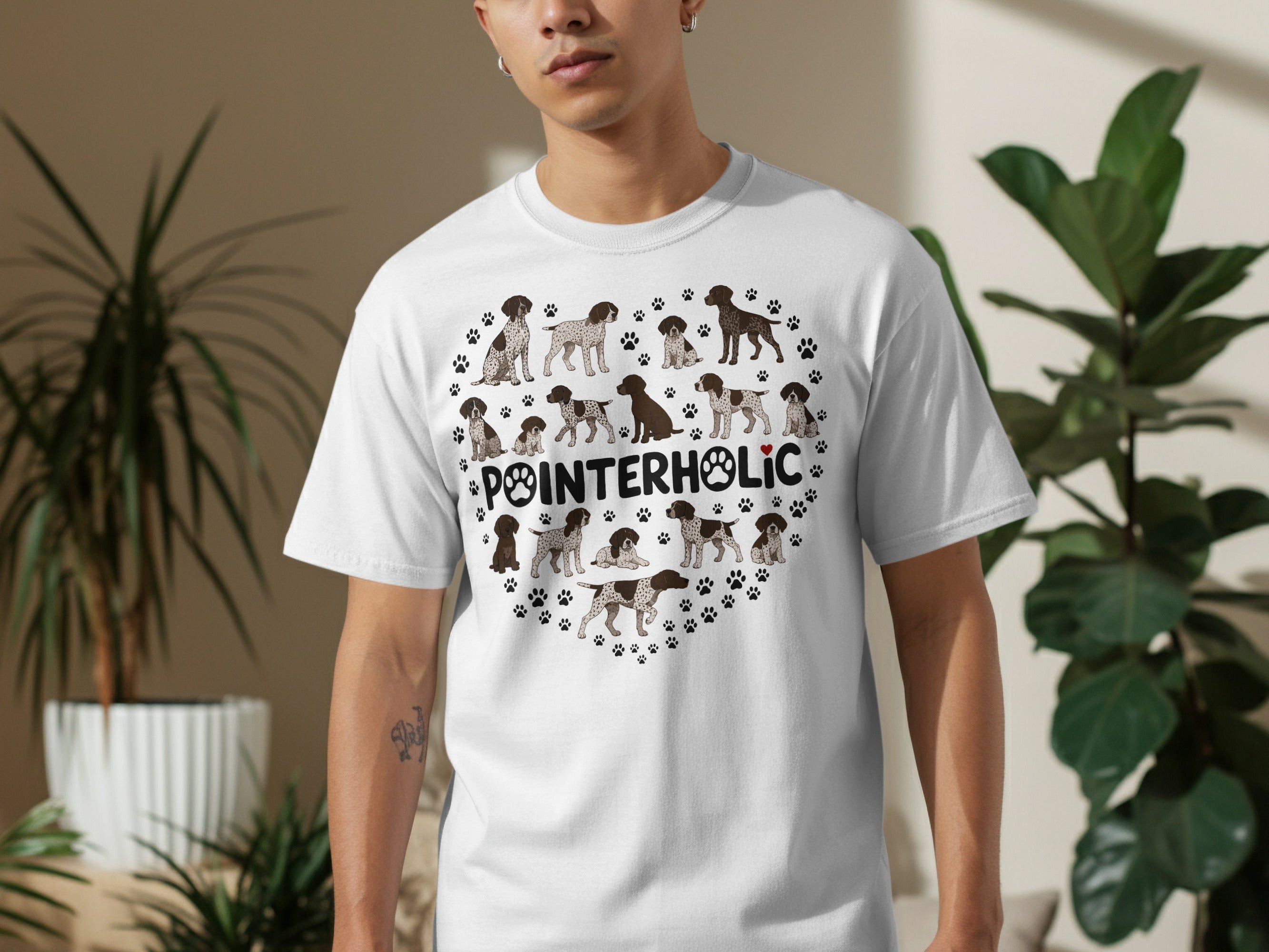 Heart-shaped design of German Shorthaired Pointers and paw prints on a white t-shirt.