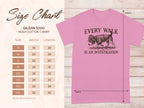 Gildan 5000 t-shirt with size chart and "Every walk is an investigation" graphic.
