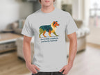 White t-shirt with a stylized dog design and text "feral little creature, perfectly formed."