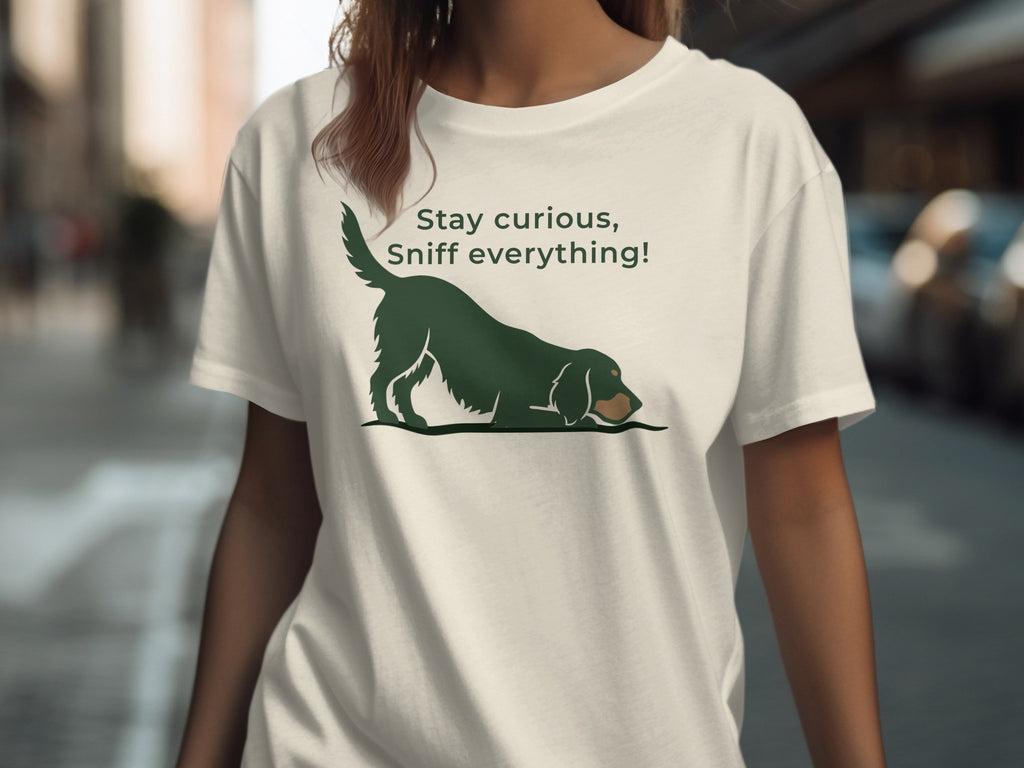 T-shirt with green dog sniffing and text "Stay curious, Sniff everything!".