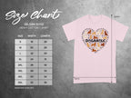 Pink Gildan 5000 t-shirt with "DOGAHOLIC" and dog paw print heart graphic.