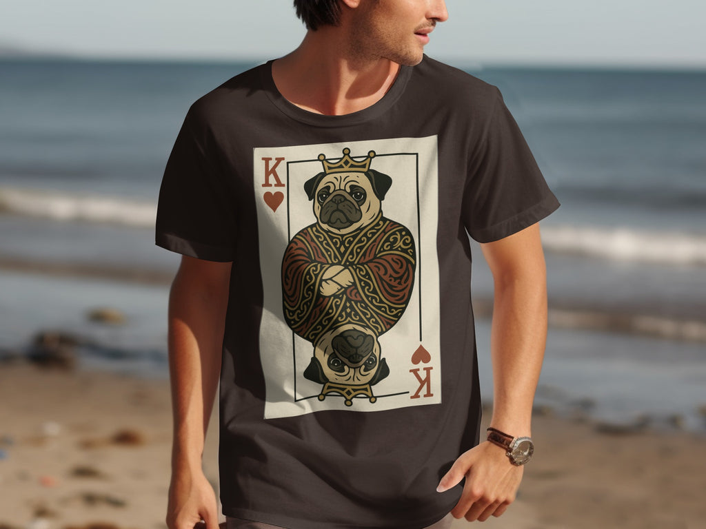A man wears a dark t-shirt with a King of Hearts playing card featuring a pug.