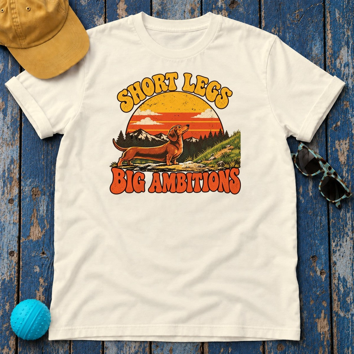 Short Legs Big Ambitions Dachshund T-Shirt in Natural - flat lay