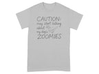 Gray t-shirt with "CAUTION: may start talking about my dog's ZOOMIES" text and dog graphic.