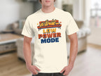 Cream t-shirt with "LOW POWER MODE" text and a cartoon dog sleeping on a couch.
