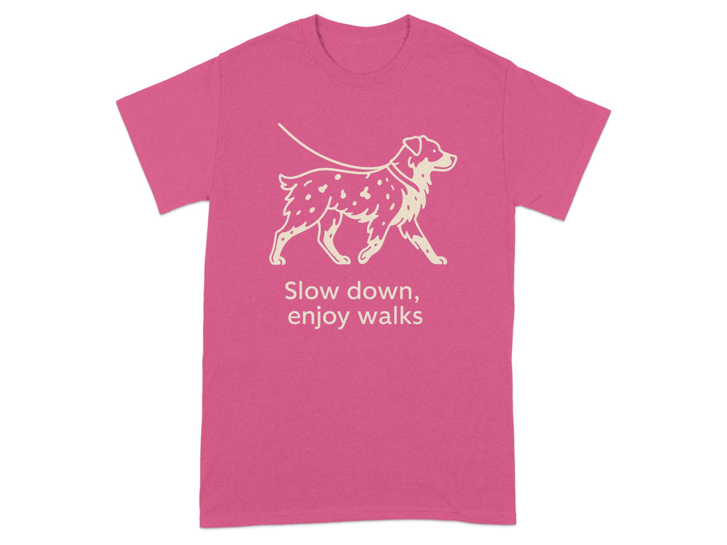 Pink t-shirt with a cream outline graphic of a dog on a leash and text.