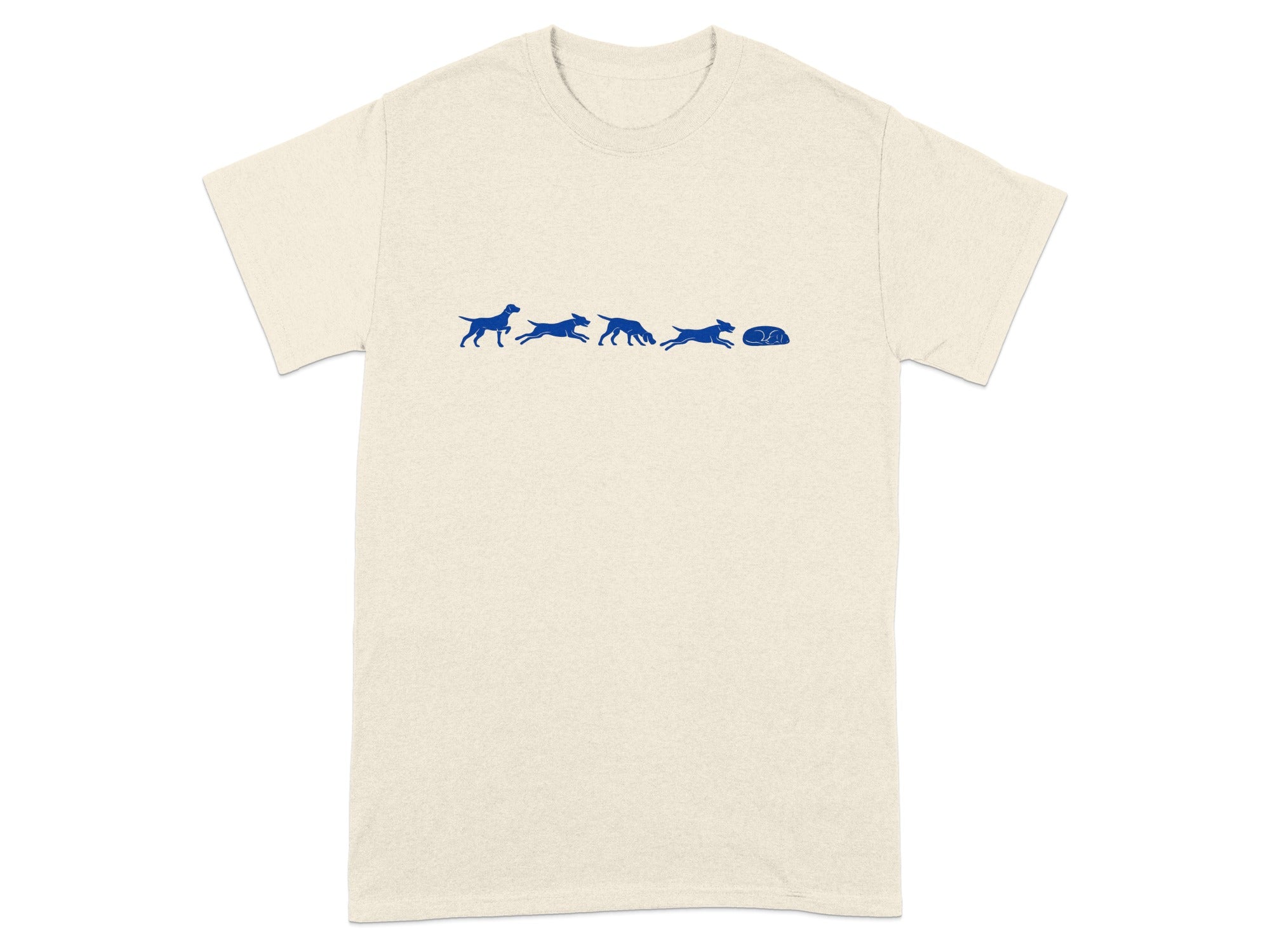 Cream t-shirt with blue dogs chasing a sleeping dog graphic.
