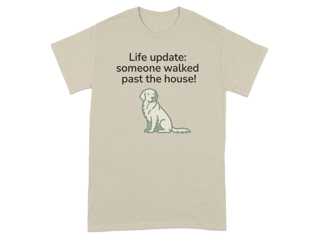 Beige t-shirt with a seated dog graphic and "Life update: someone walked past the house!" text.