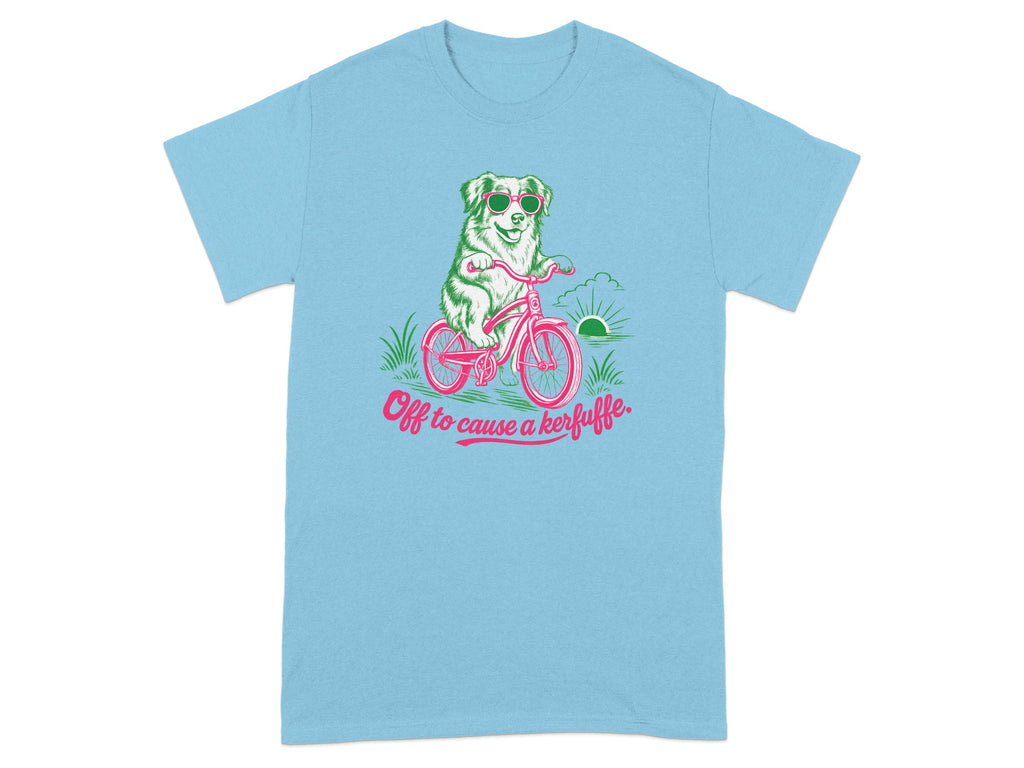 Light blue t-shirt with a dog on a bicycle and the text "Off to cause a kerfuffle."