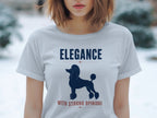 White t-shirt with navy poodle silhouette and text "Elegance With Strong Opinions".