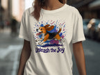 White t-shirt with watercolor beagle running and the text "Unleash the Joy."