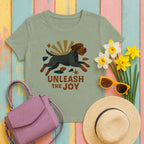 wpg unleash-the-joy tee flat lay hero v8