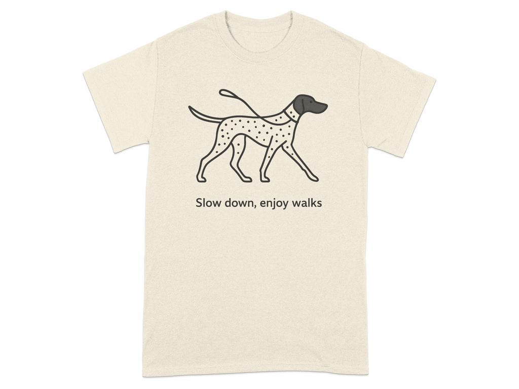 Cream t-shirt with a graphic of a Dalmatian dog and the text "Slow down, enjoy walks".