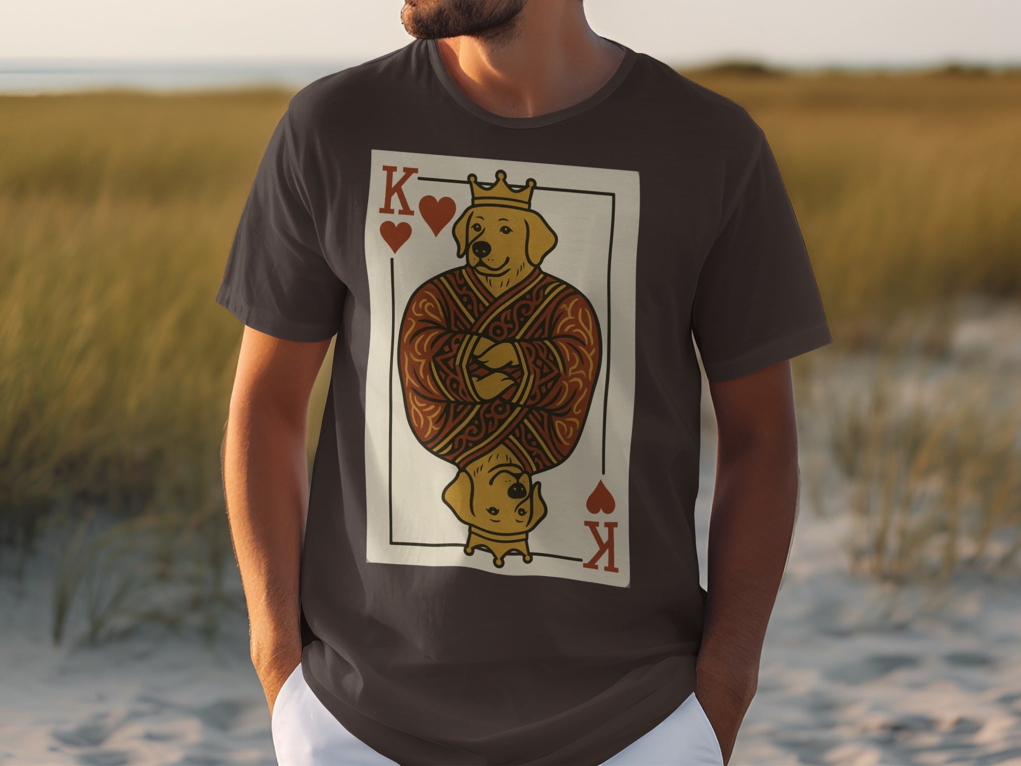 Graphic t-shirt featuring a golden retriever depicted as a king of hearts playing card.