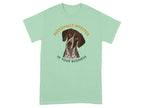Dog wearing shirt that says "Personally Invested in Your Business."