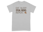Grey t-shirt with "EAT. SLEEP. STEAL SOCKS. REPEAT." and dog icon.