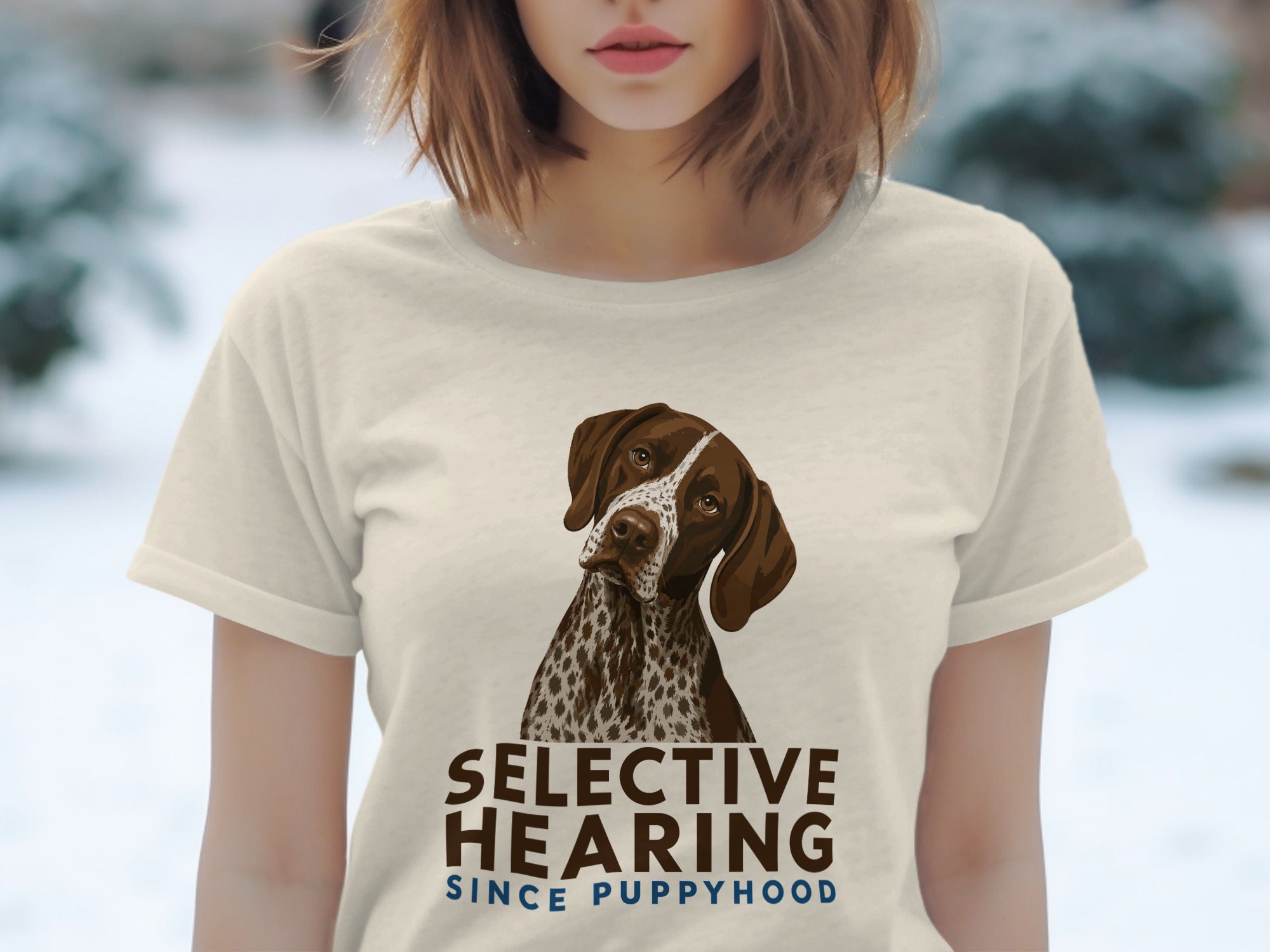 Cream t-shirt with a German Shorthaired Pointer illustration and "Selective Hearing Since Puppyhood" text.