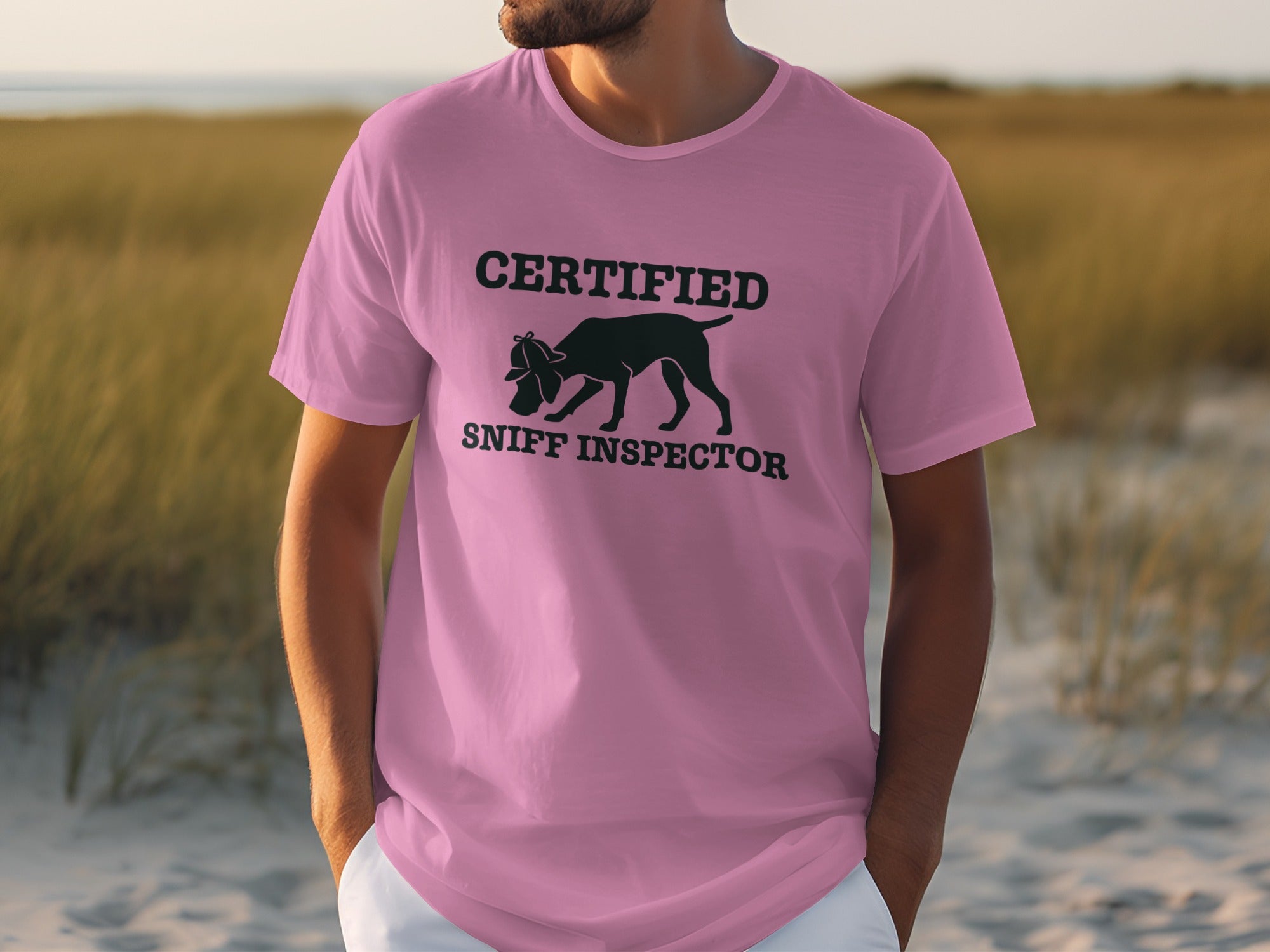 Pink t-shirt with "Certified Sniff Inspector" and dog outline design.