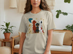 Tan t-shirt with illustration of five dogs sitting in a row.